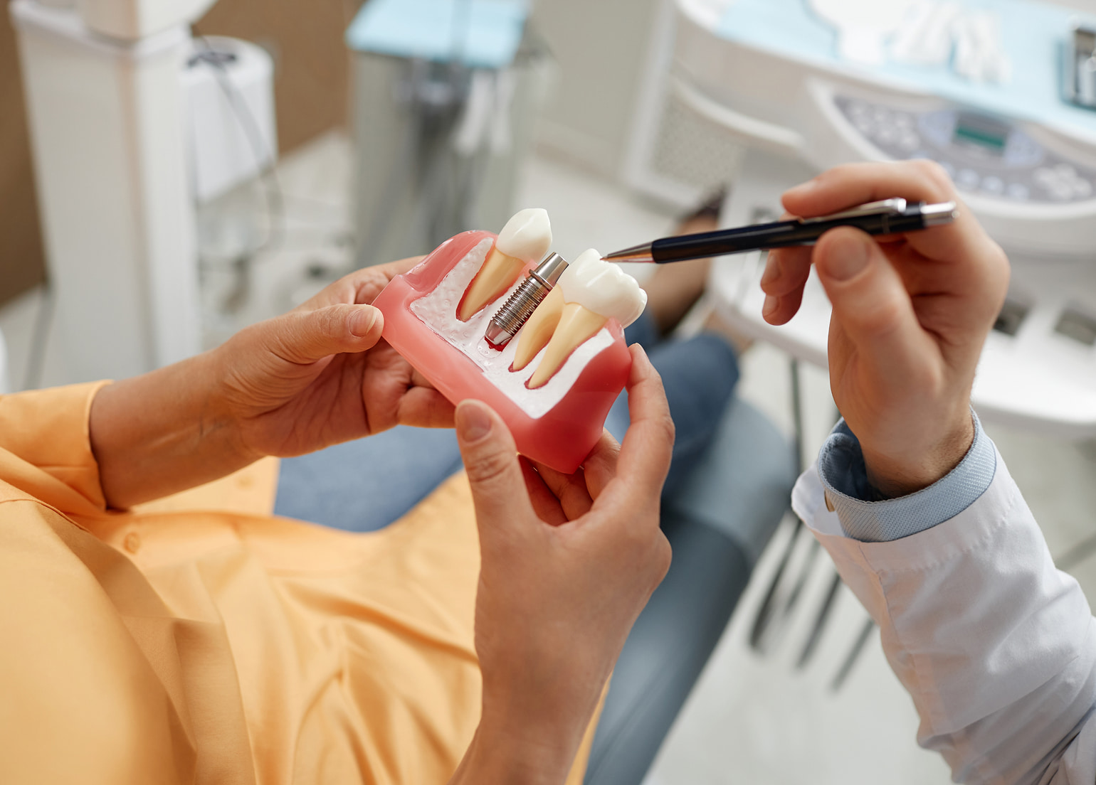 Restore confidence and chewing strength with natural-looking dental implants at Rice Digital Dentures & Implants